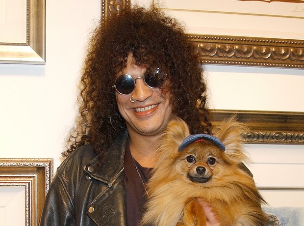 Slash with his dog Foxy Brown