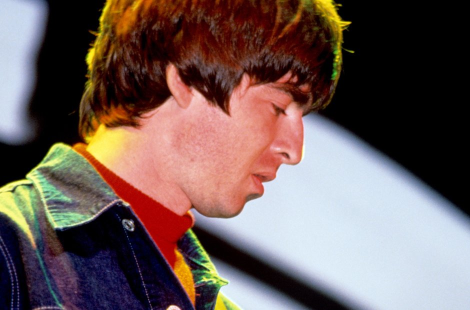 Noel Gallagher onstage at Knebworth 1996