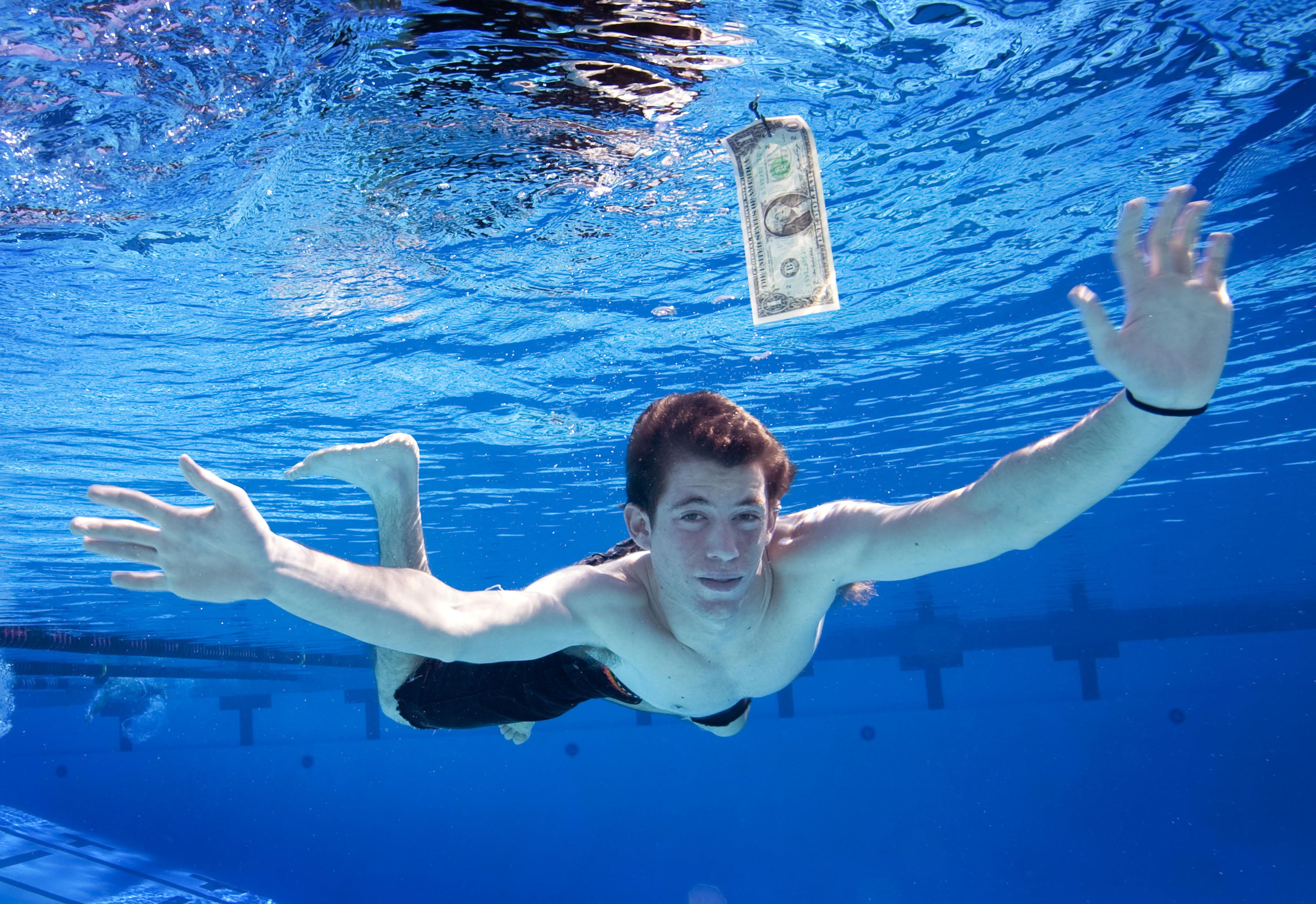 The Nirvana Nevermind album cover baby recreates the picture 25 years later : PastAndPresentPics