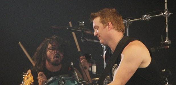 Josh Homme and Dave Grohl with John Pual Jones