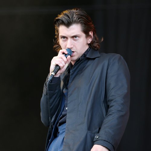 Alex Turner performing 2016