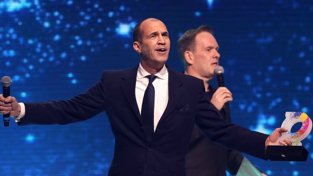 Johnny Vaughan and Chris Moyles on stage during Th
